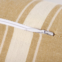 White zipper on a beige and white striped fabric background
