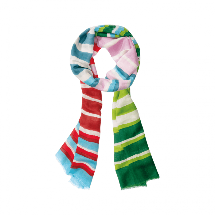 Colorful striped scarf on a green background