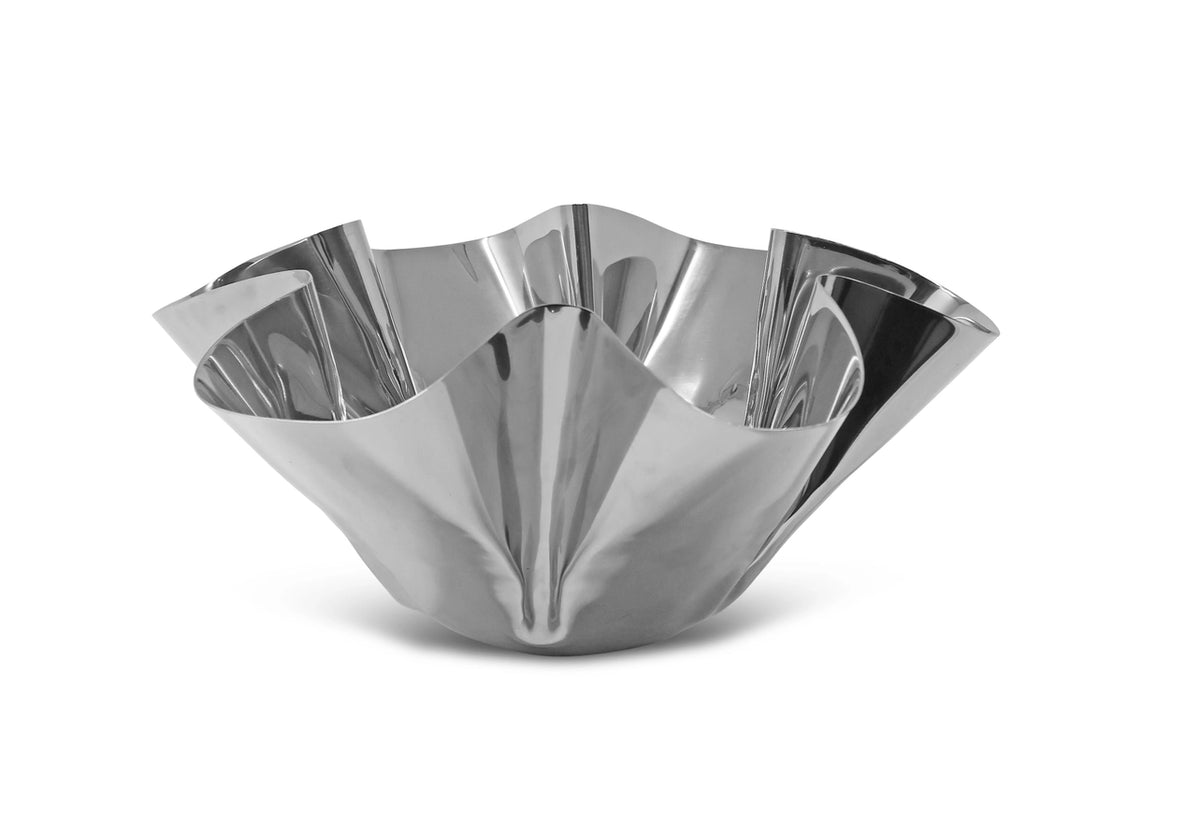 Silver metallic bowl with wavy design on a white background