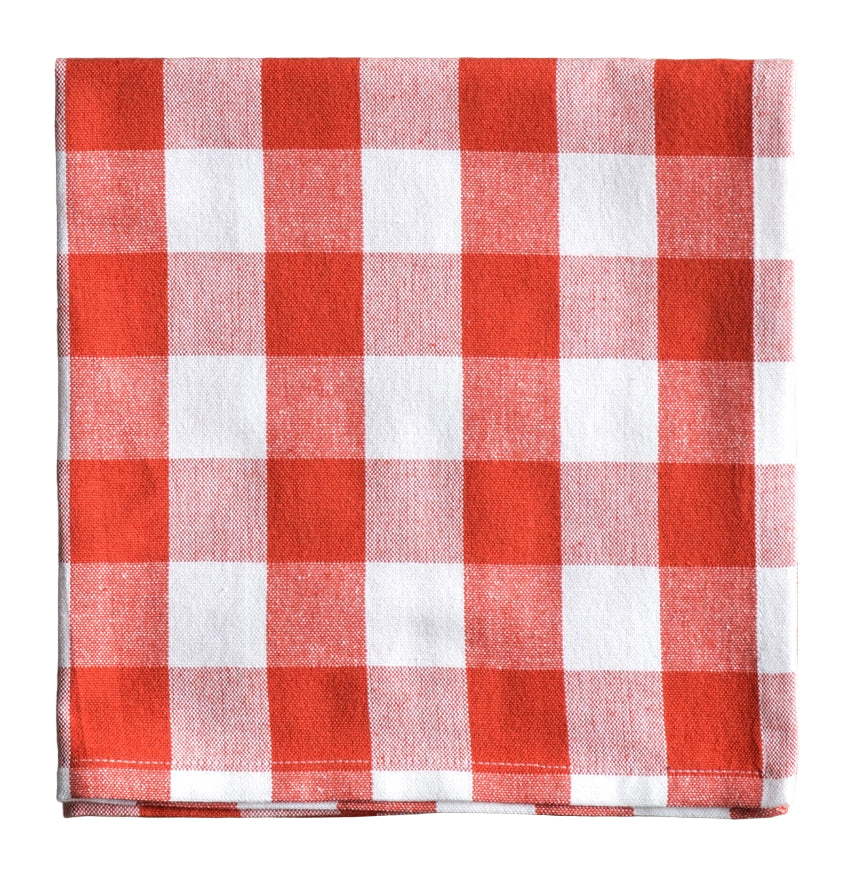 Red and white checkered napkin on a white surface
