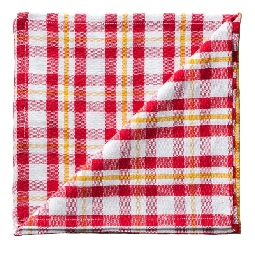 Red and yellow checkered fabric napkin  on a white background