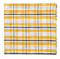 Yellow and white checkered fabric on a white background