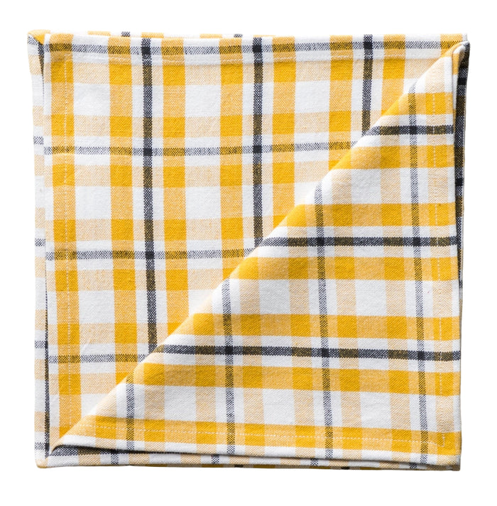 Yellow and white plaid fabric on a gray background