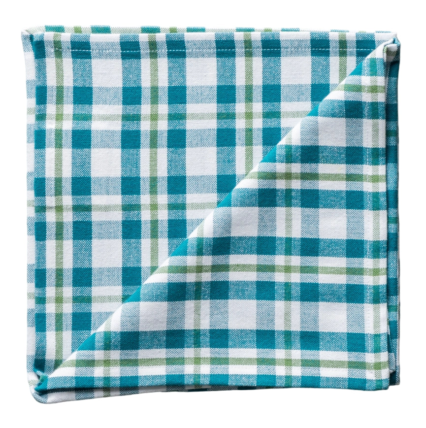 Folded teal and white checkered fabric on a white background