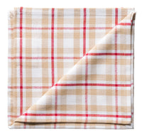 Folded plaid fabric with red and beige pattern on a white background