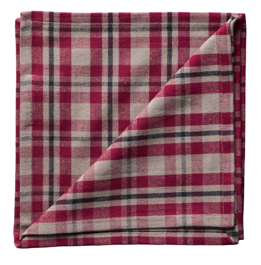 Folded red and white plaid napkin on a white background