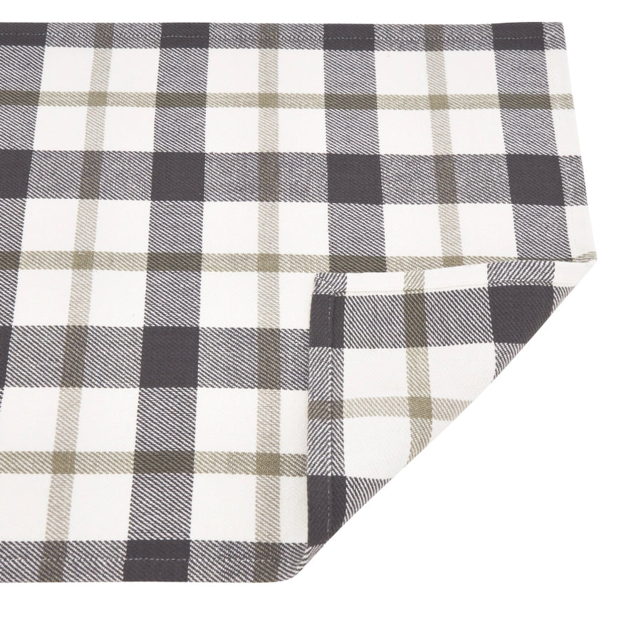 Plaid fabric with black, white, and beige pattern on a white background