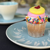 blue and white side plate with cupcake