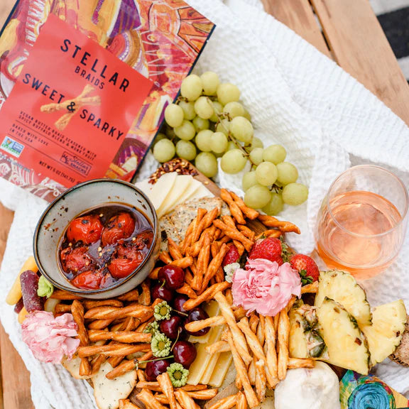 stellar snacks pretzel bag and snack board with fruit, cheese and pretzel braids