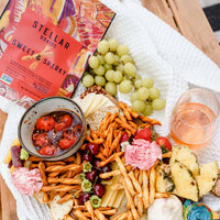 stellar snacks pretzel bag and snack board with fruit, cheese and pretzel braids
