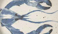 detail of lobster illustration on appetizer plate