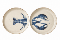 set of two appetizer plates with a blue head and teal of lobster on a white back ground