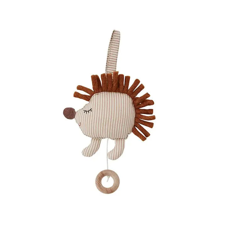 cotton hedgehog toy with striped mane and wooden ring on a white background