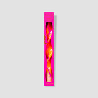 Pink packaging with a wavy design on a light gray background