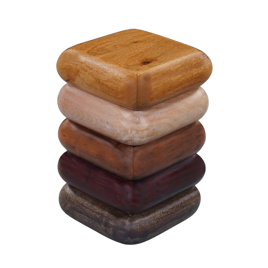 Stack of five wooden blocks in different colors on a white background
