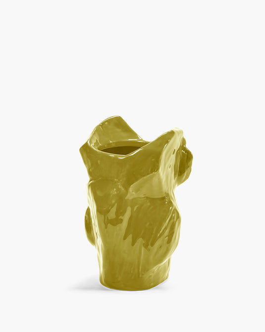 yellow ceramic vase in abstract owl shape on white background
