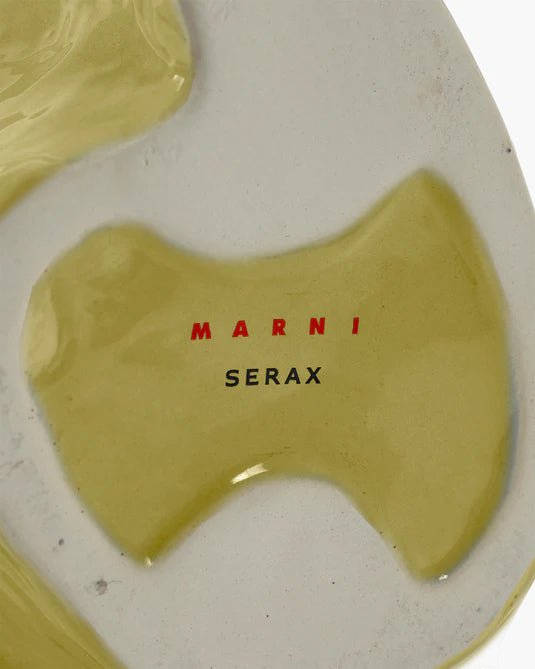 red Marni logo for Serax on bottom of yellow ceramic vase