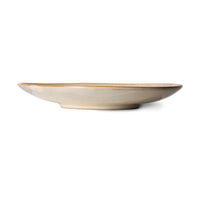 soft toned ceramic side plate on white background