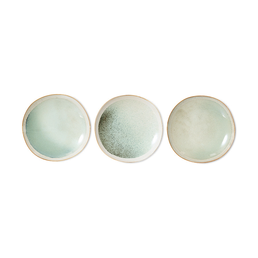 variations of 3 stoneware side plates in soft green and white colors 