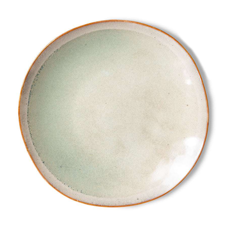soft toned ceramic side plate on white background