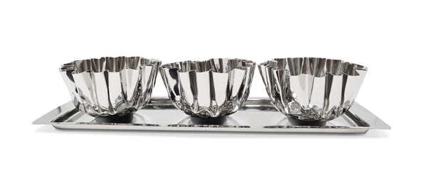 Set of three silver bowls on a tray with a white background