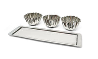 Set of three silver tart tins with a tray on a white background