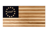 Wooden cutting board with a black section featuring stars and '250th' text on a black background