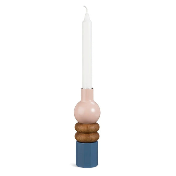 stacked wooden candle holder with brown, blue and blush colors on a white background