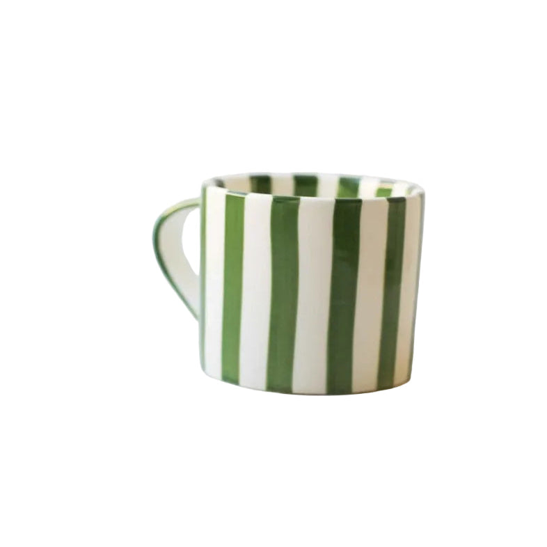 green and white striped ceramic mug with ear on a white background