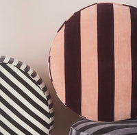 round velvet ottomans with bold stripes