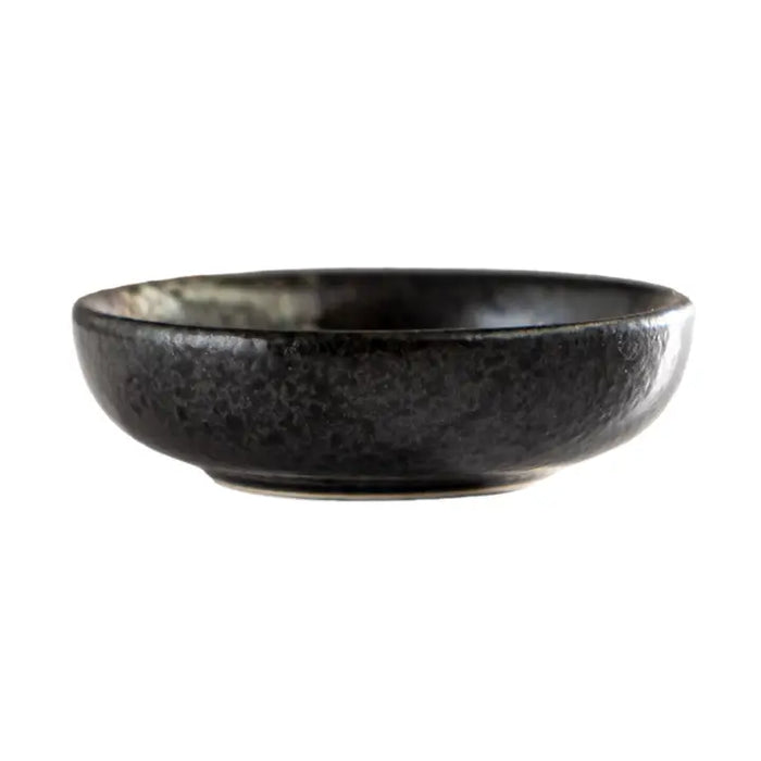 Black ceramic bowl on a white background