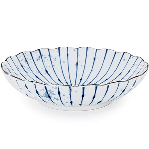 Decorative bowl with blue stripes on a white background