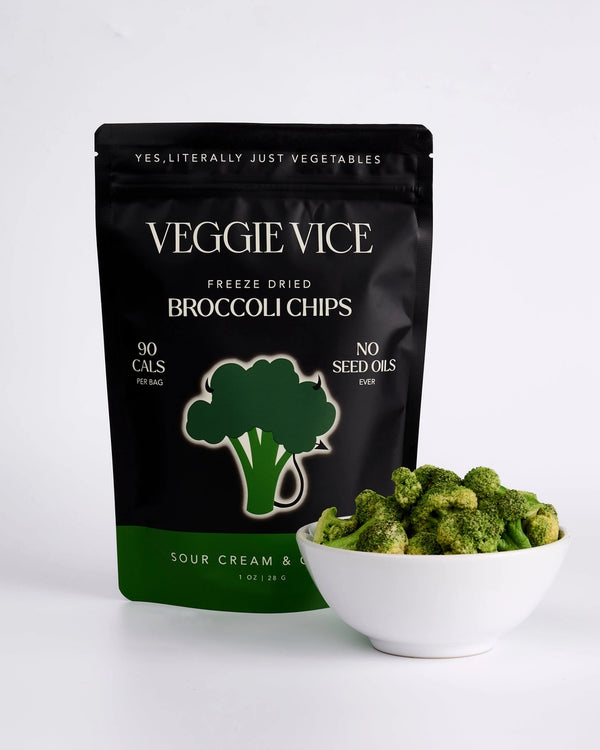 Veggie Vice freeze-dried broccoli chips packaging with a bowl of chips on a white background