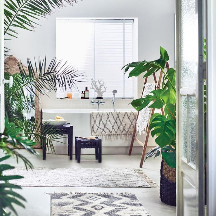 bathroom with multiple bathmats