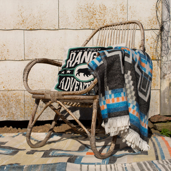 rattan natural chair with hand embroidered cusion