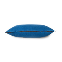 blue linen lumbar pillow with brown cotton trim