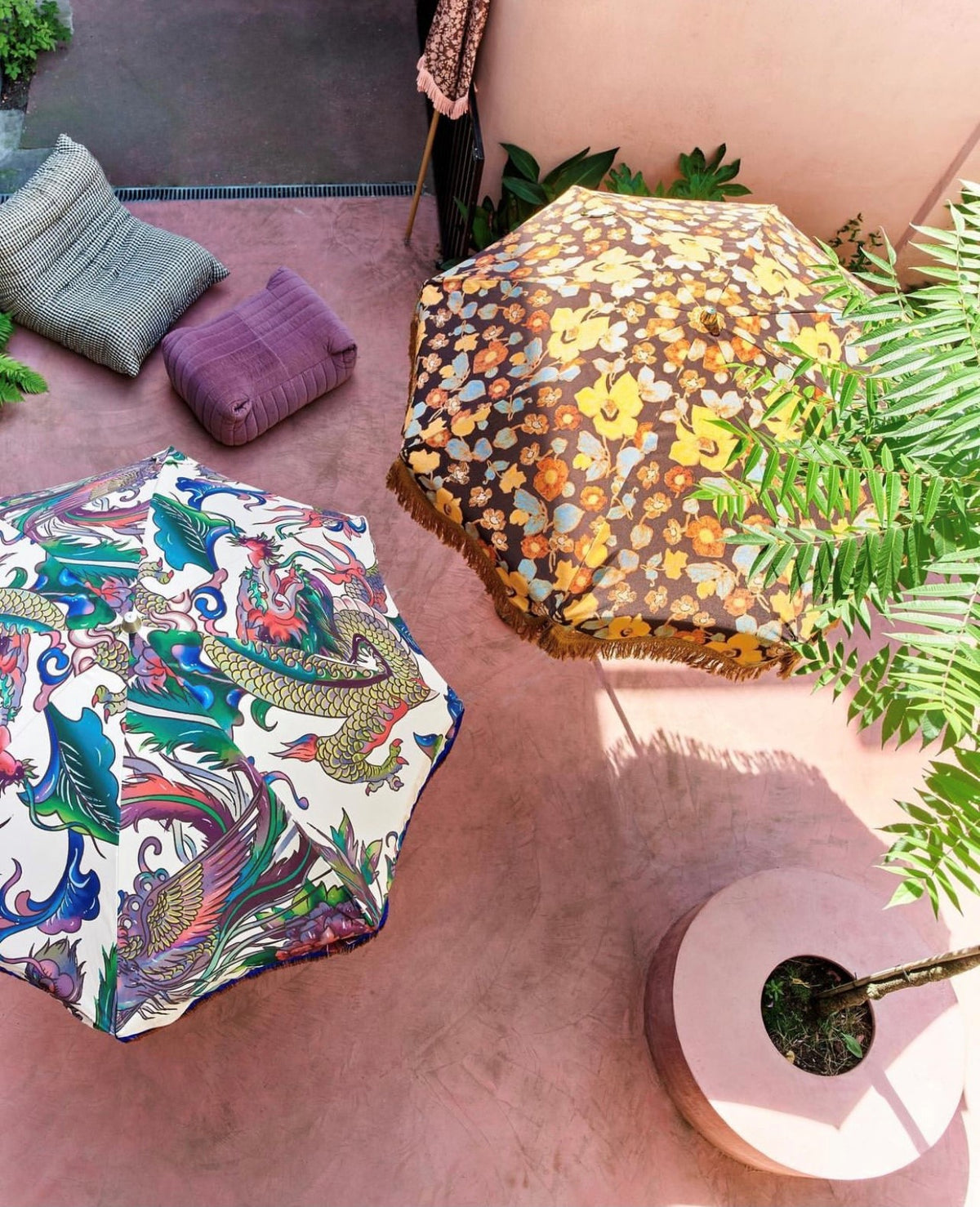 2 retro style parasols seen from the top in an open patio