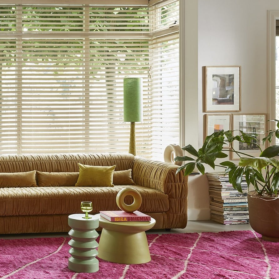 eclectic living room with green colored accent tables made from stoneware
