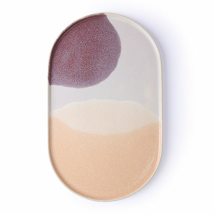 oval shaped stoneware dinner plate with purple and peach and cream color