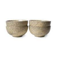 4 stoneware bowls in peach color with dark speckles