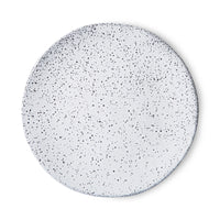 white side plate with dark speckles
