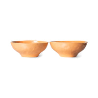 two porcelain organic shaped orange bowls