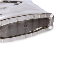 bottom of bag of chips silver vase object