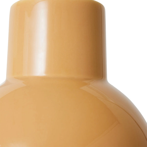 detail of cappuccino brown colored round flower vase