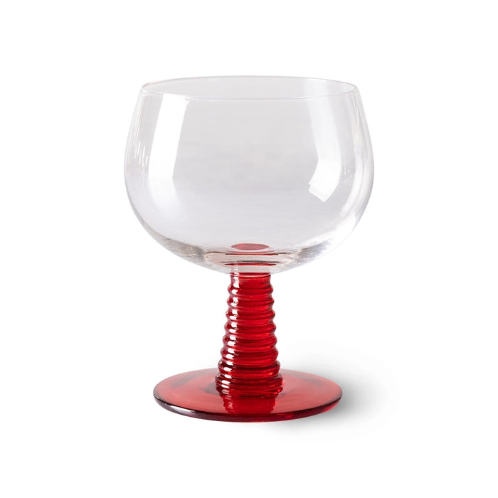 retro style wine glass with red colored low stem
