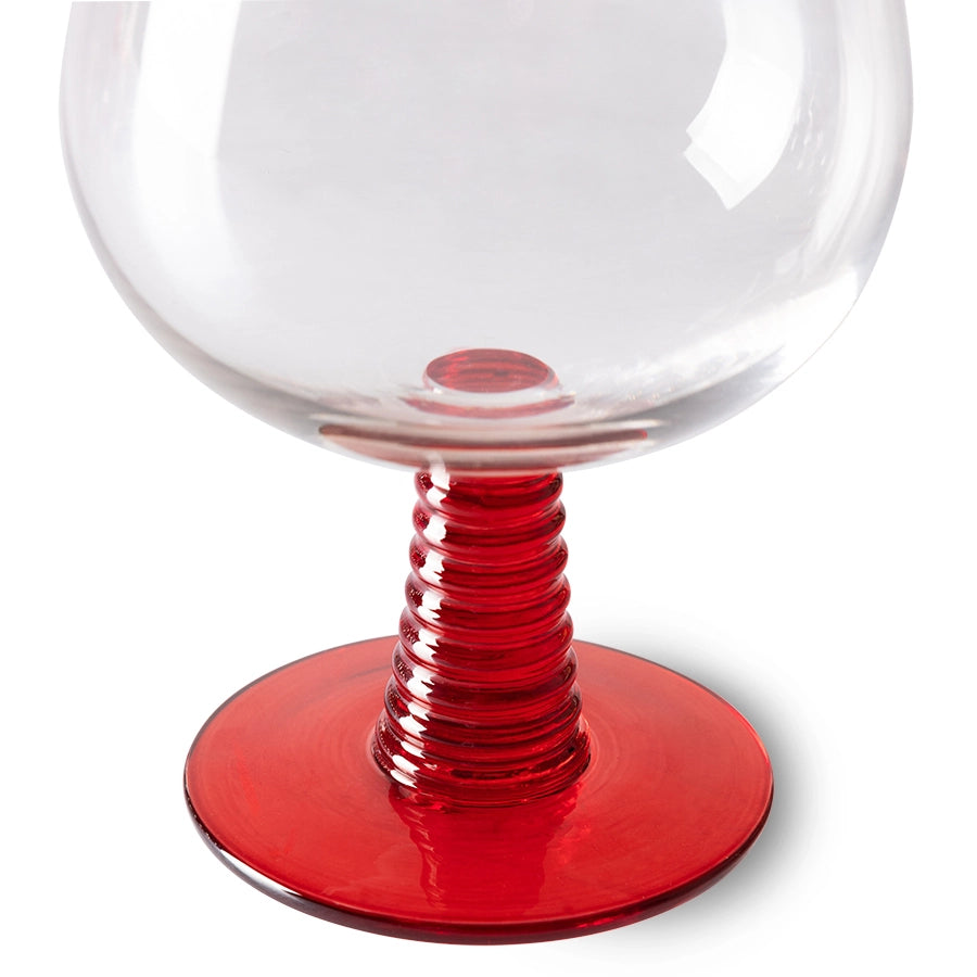 retro style wine glass with red colored low stem