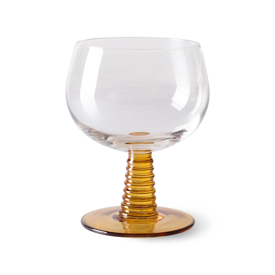retro style wine glass with ochre colored low stem