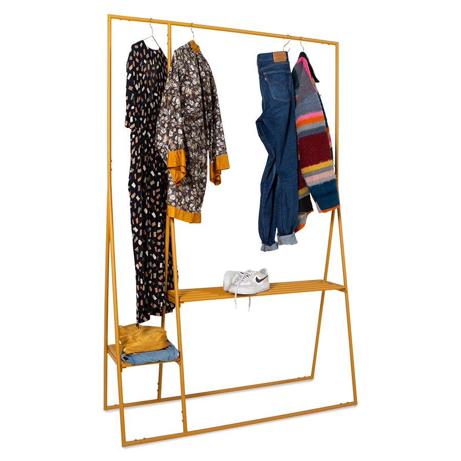 ginger orange metal open wardrobe rack with jeans and dresses hanging