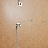 detail of back loader from wooden art frame