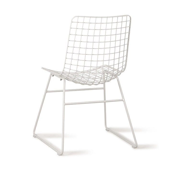 back of a white metal chair